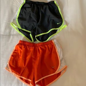 Two pairs of Nike running shorts
